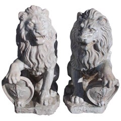 Pair of French Glazed Terracotta Lions Grasping Fleur De Lis Plaques, Circa 1840