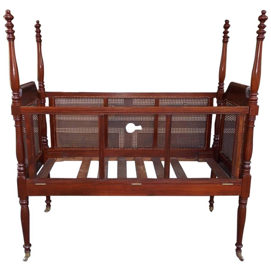 Charleston Mahogany Urn Finial Four-Poster Crib with Caning, Circa 1800 For Sale