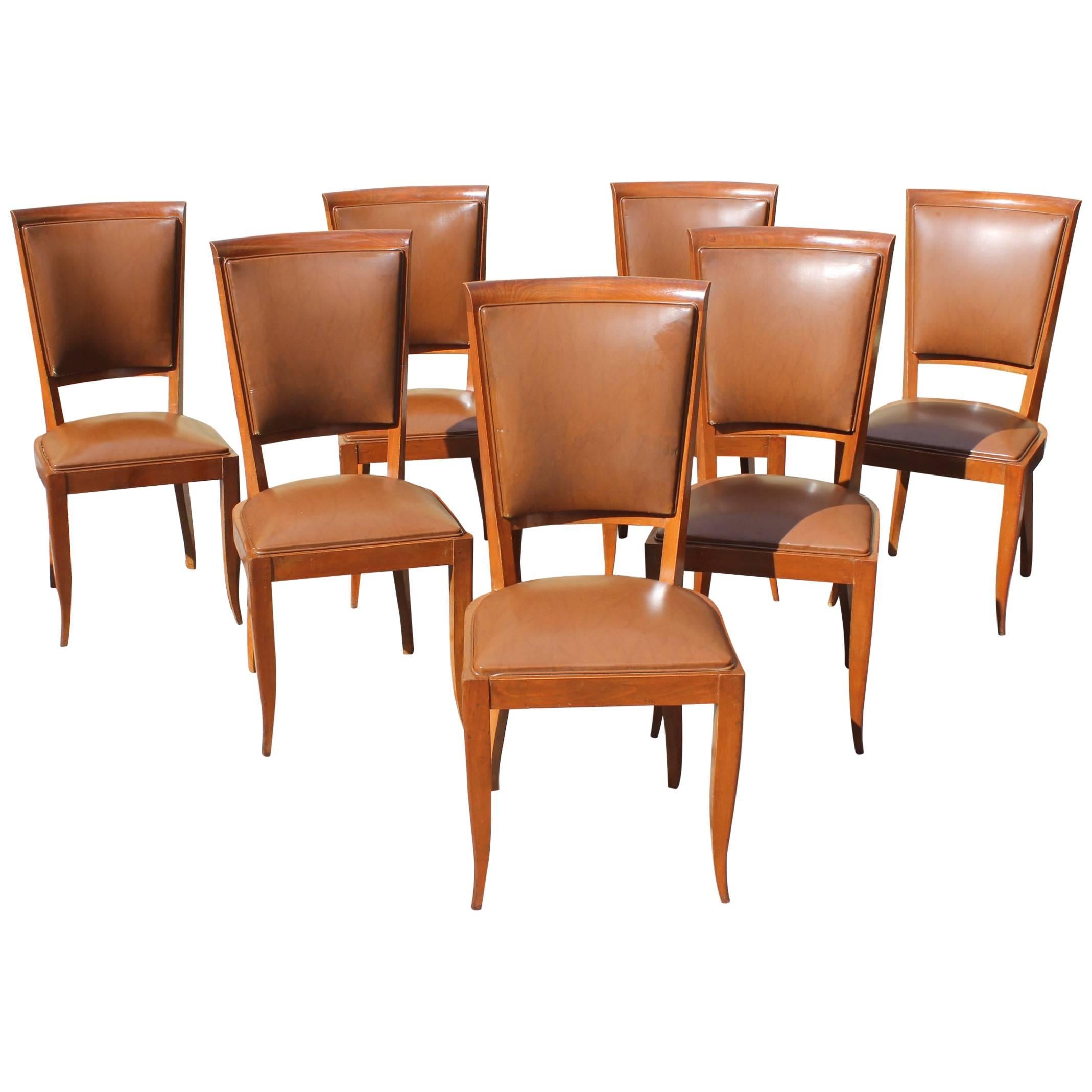 Classic Set of Seven French Art Deco Solid Mahogany Dining Chairs, circa 1940s