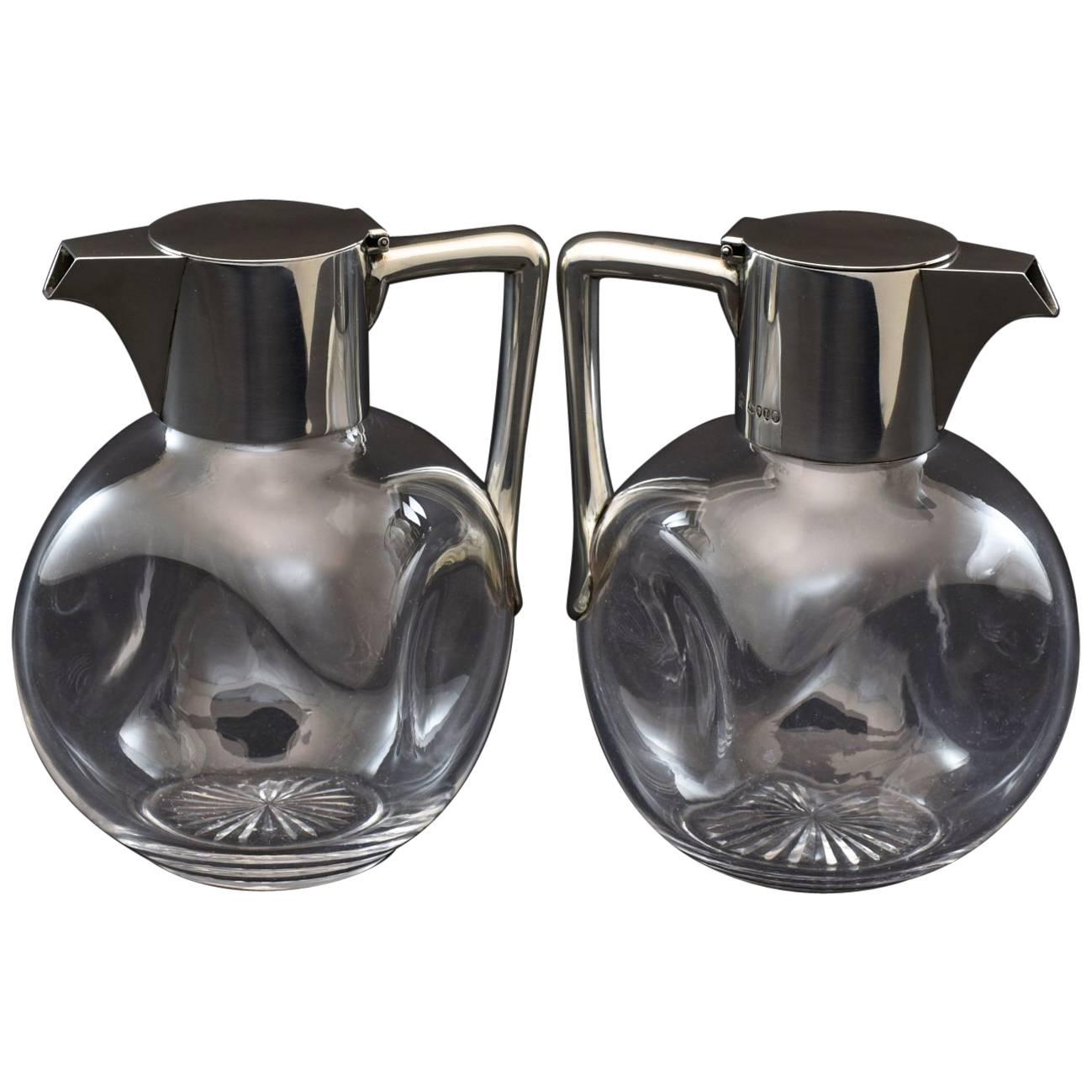 Pair of Silver and Cut-Glass Claret Jugs