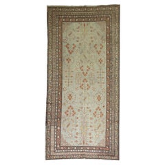 Colección Zabihi Alfombra marfil de tamaño galería Khotan de principios del siglo XX