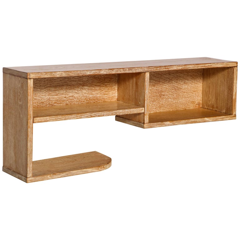 Pair Royere Gouffe cerused oak wall shelf deco, 1930s, France

Beautiful cerused wall shelf with an interesting shape. The shelf is a good example of timeless design.
This shelf was part of a seven piece set. Five of the seven pieces are signed with