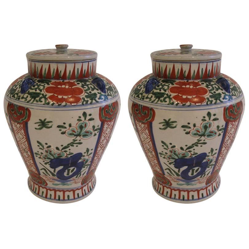 Pair of Chinese "Wucai" Style Porcelain Covered Jars