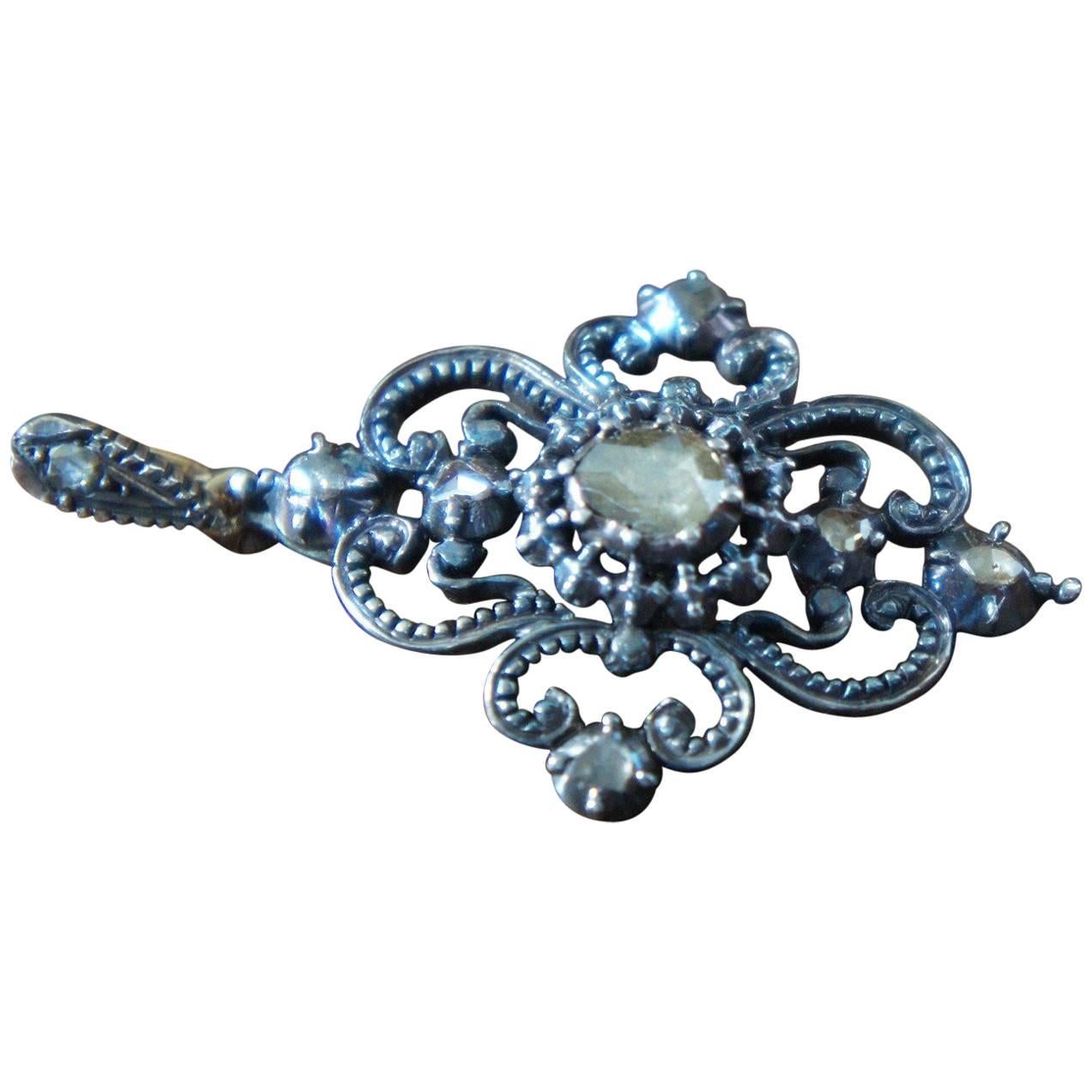 Late 19th Century Silver Pendant with Eight Rose Diamonds, circa 1880-1890  For Sale