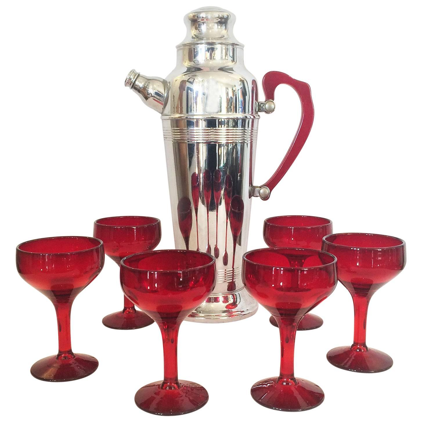 Art Deco Chrome Cocktail Set with Bakelite Handles and Ruby Glasses For Sale