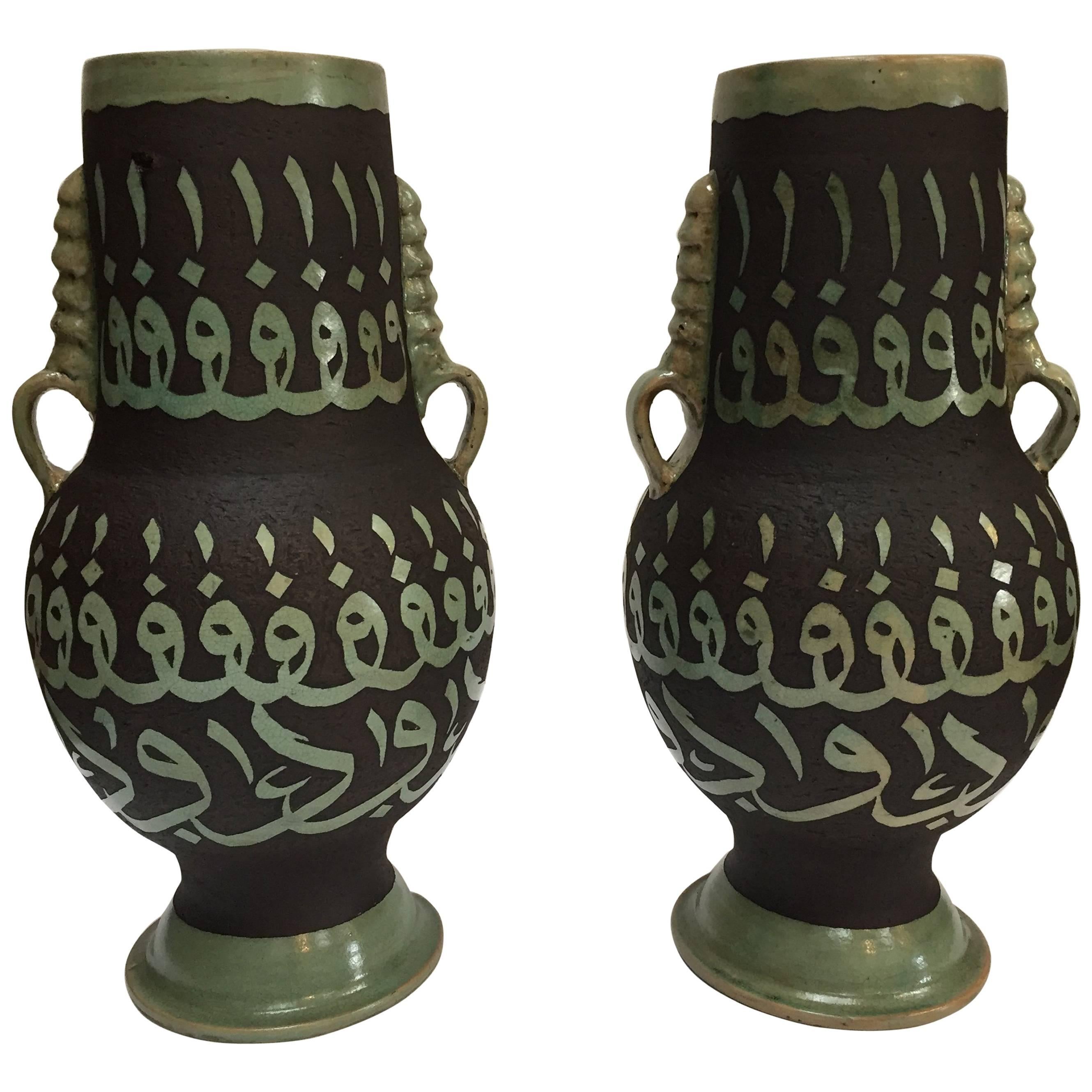 Pair of Green Moroccan Ceramic Vases with Chiseled Arabic Calligraphy Writing For Sale