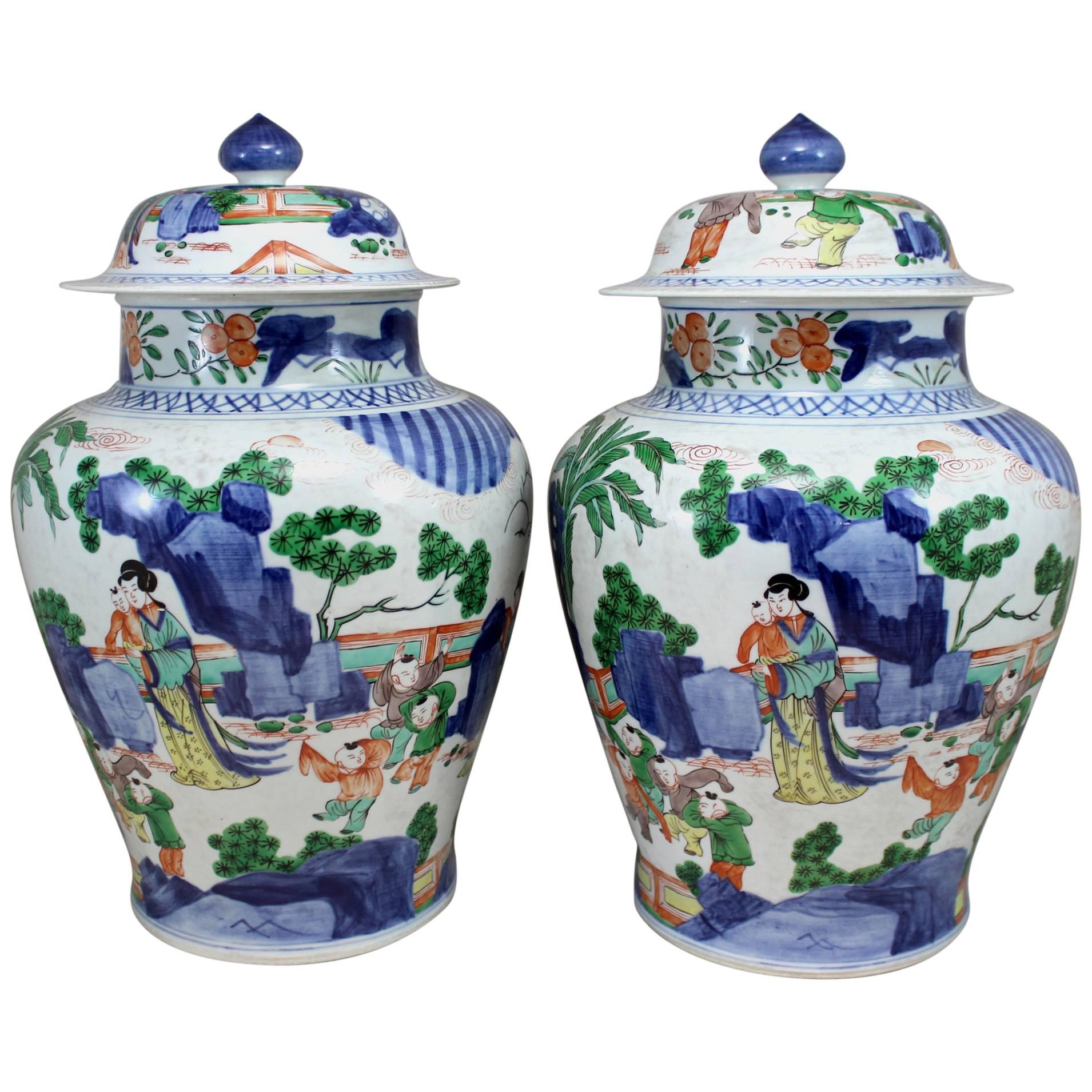 Pair of 19th Century Chinese Qing Dynasty Polychrome Covered Porcelain Jars