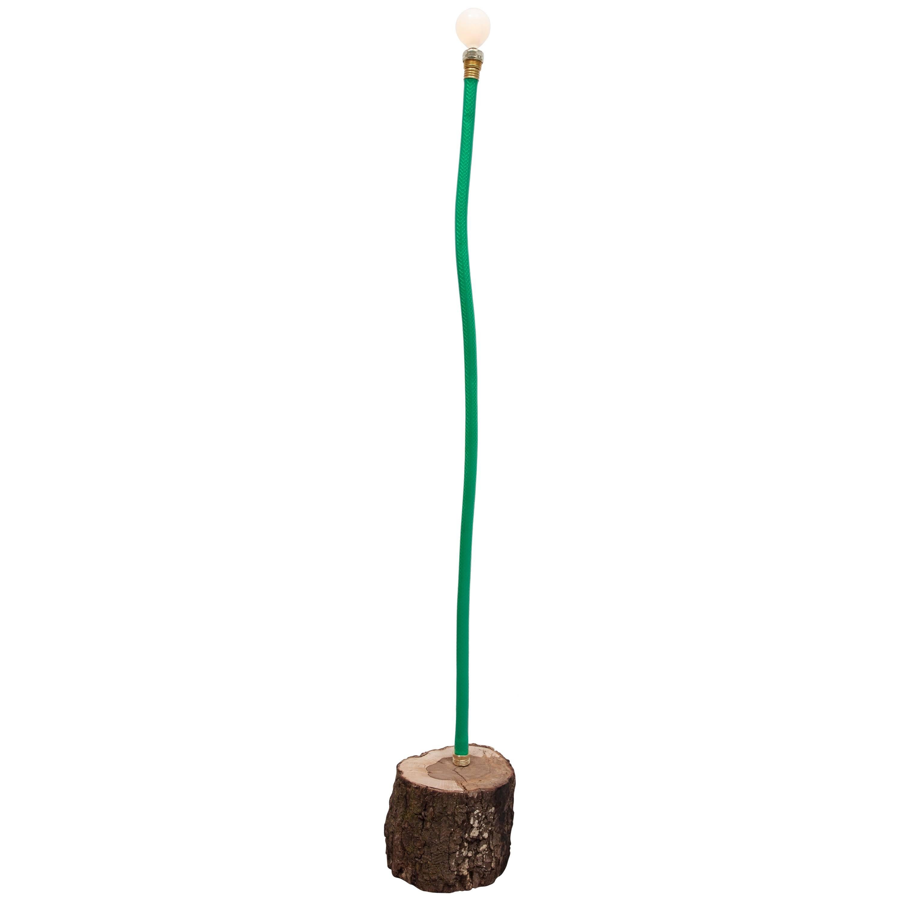 Floor Lamp with Green Garden Hose and Log Base For Sale