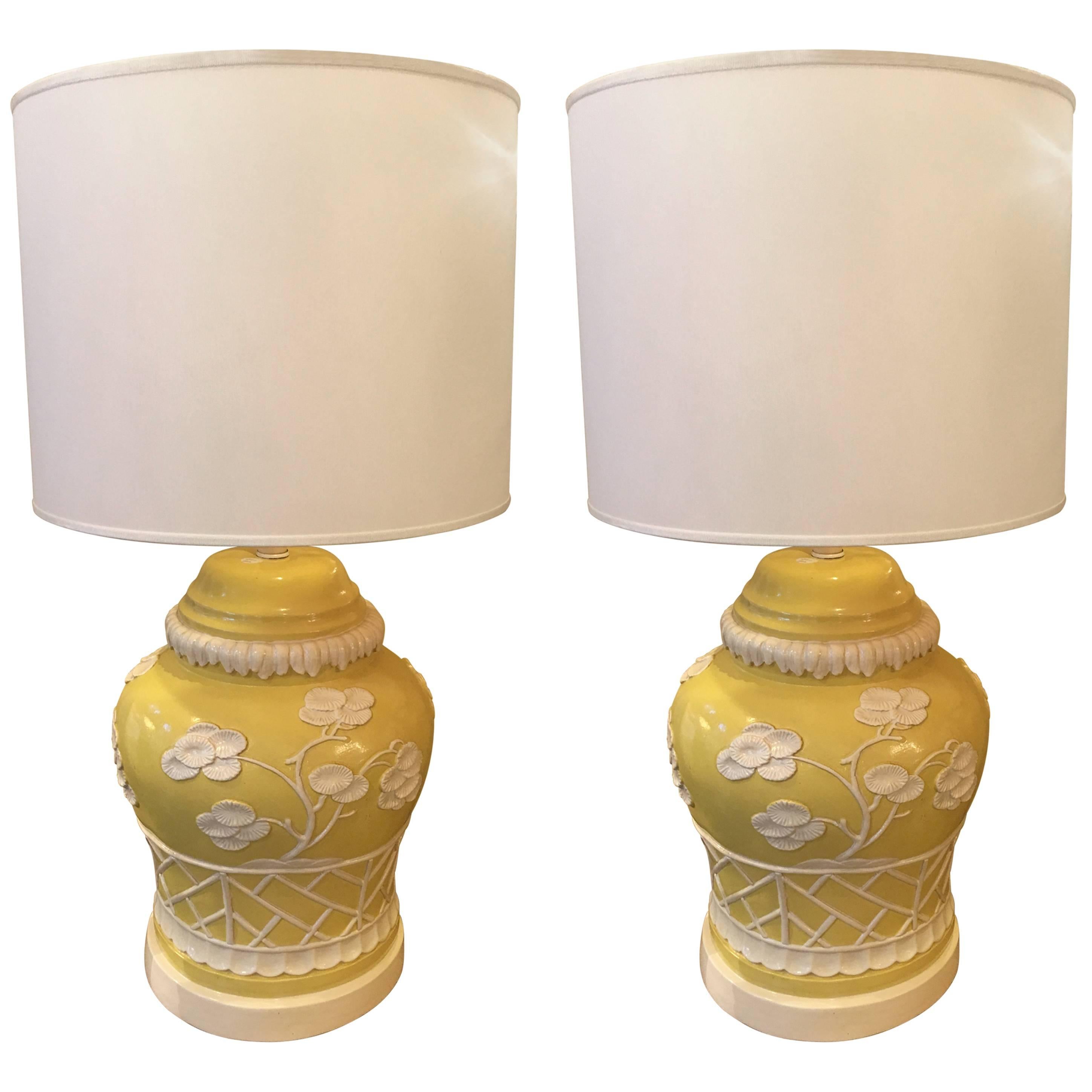 Pair of midcentury American yellow and white temple jar shape Chinese style lamps.