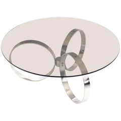 Modernistischer Vintage-Couchtisch aus verchromtem Metallglas mit drei Ringen aus Chrom, 1970er Jahre