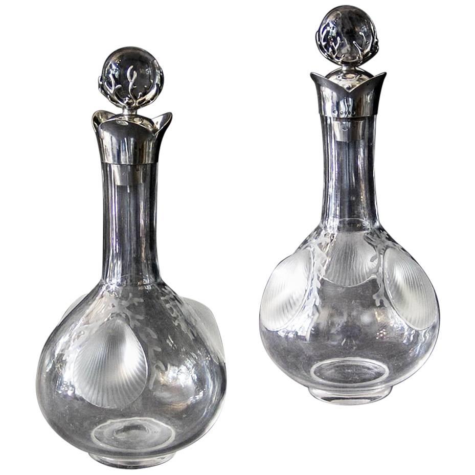 Pair 19th Century E.H. Stockwell Silver Topped Decanters