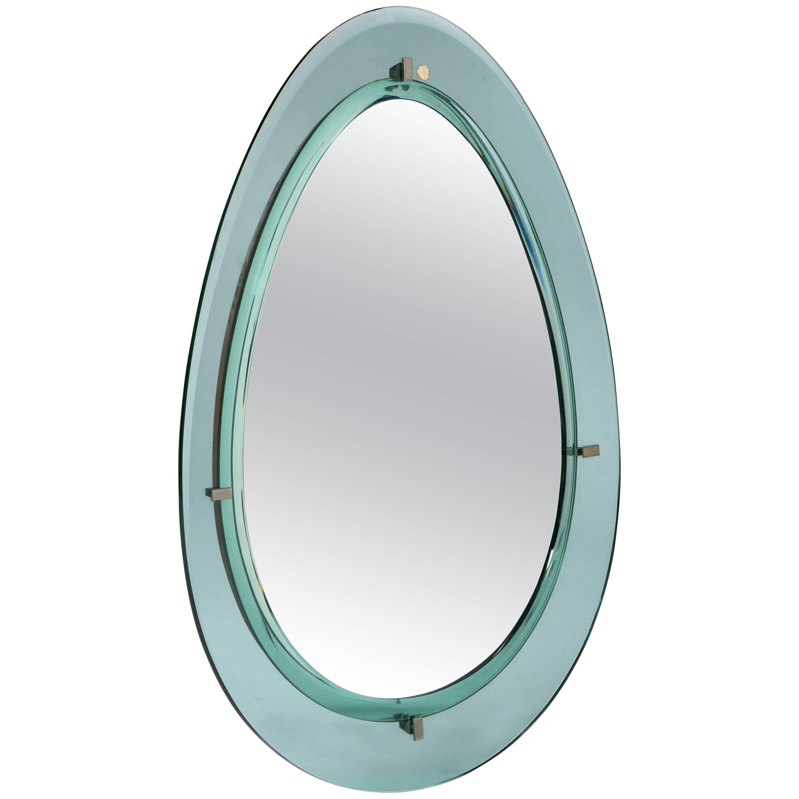 Cristal Art oval wall mirror with double glass border, Italy circa 1960 For Sale