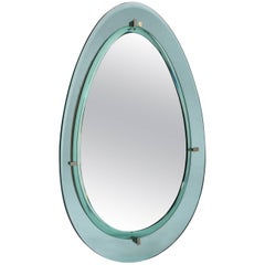 Cristal Art oval wall mirror with double glass border, Italy circa 1960