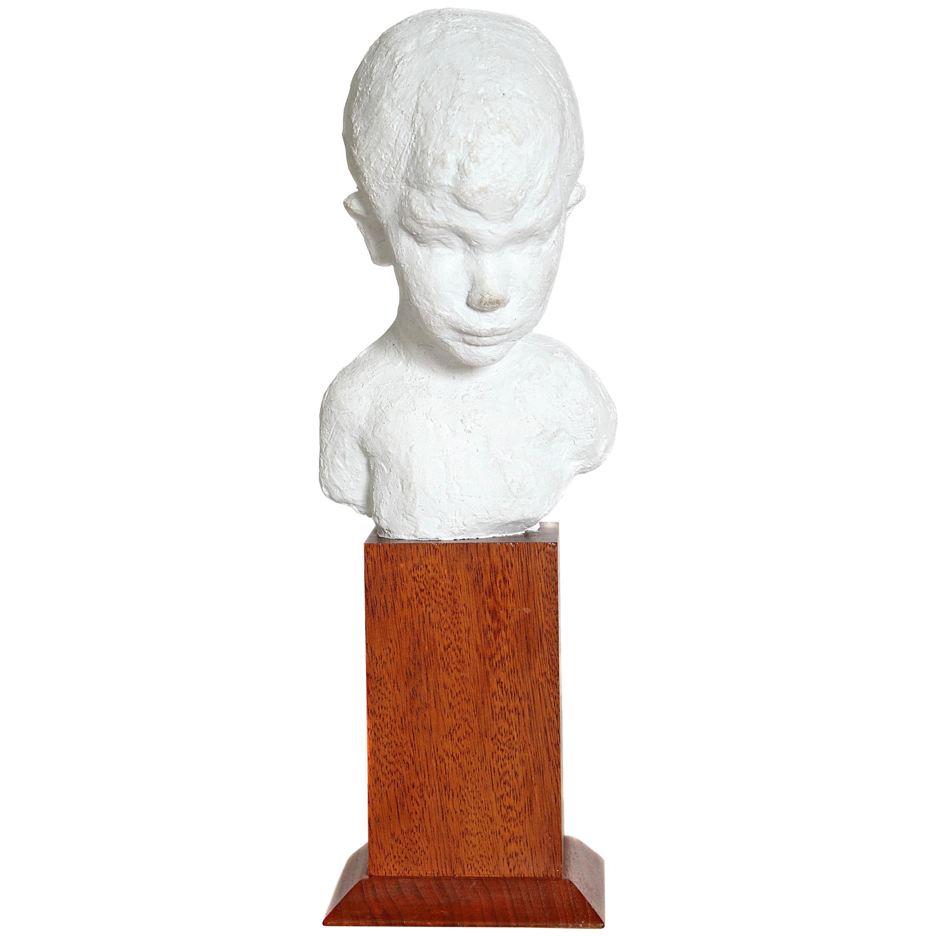 Bust of Young Boy on Mahogany Stand For Sale