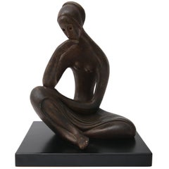  Sculpture of a Seated Female in Bronze Coloration