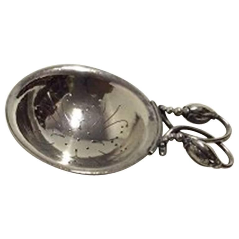 Jensen Sterling Silver "Blossom" Tea Strainer No. 84 For Sale at