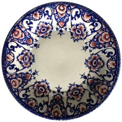 Plato de loza azul y roja de Gien del siglo XIX