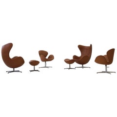 Two Egg Lounge Chairs with Ottoman and Two Swan Armchairs