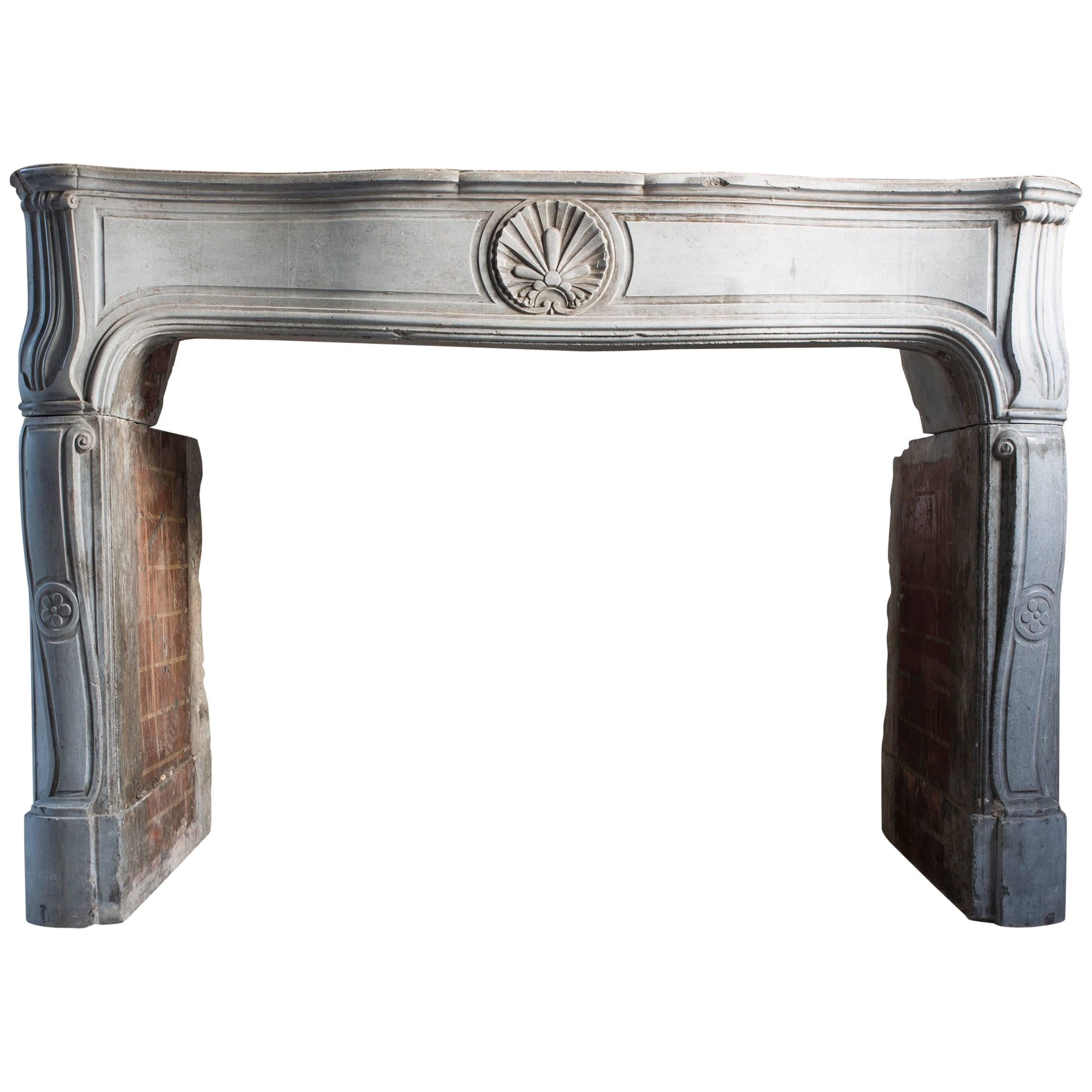 Antique Fireplace carved in French Burgundy Stone For Sale
