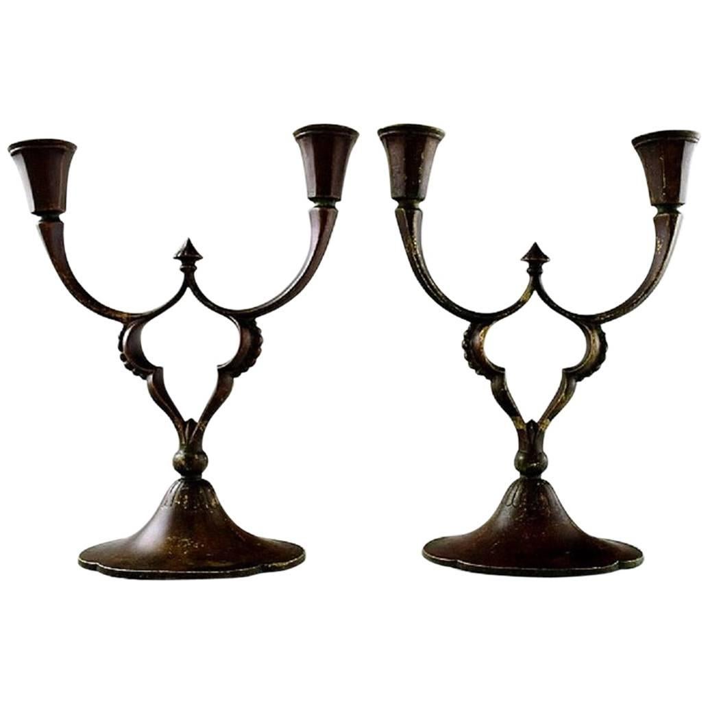 Just Andersen, Pair of Two-Armed Candelabras of Patinated Bronze