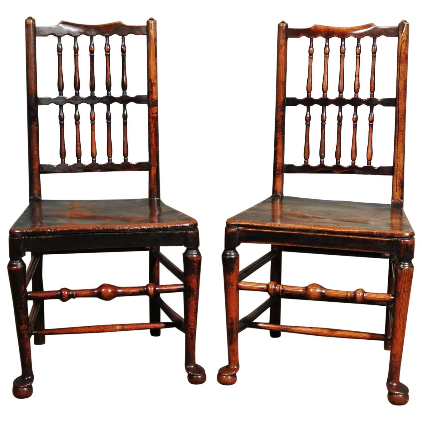 Pair of 18th Century Elm Spindle Back Chairs with Exemplary Patina, circa 1750 For Sale