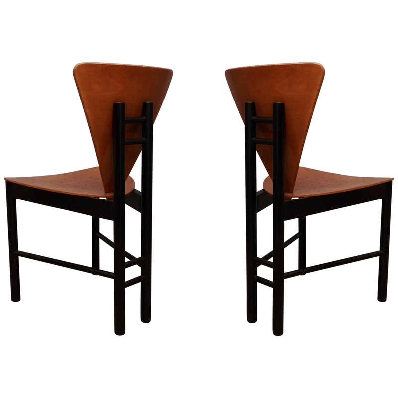 Pair of wood tri-leg triangular side chairs with upholstered seats at ...