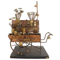 Curtis Jere Flower Cart Sculpture