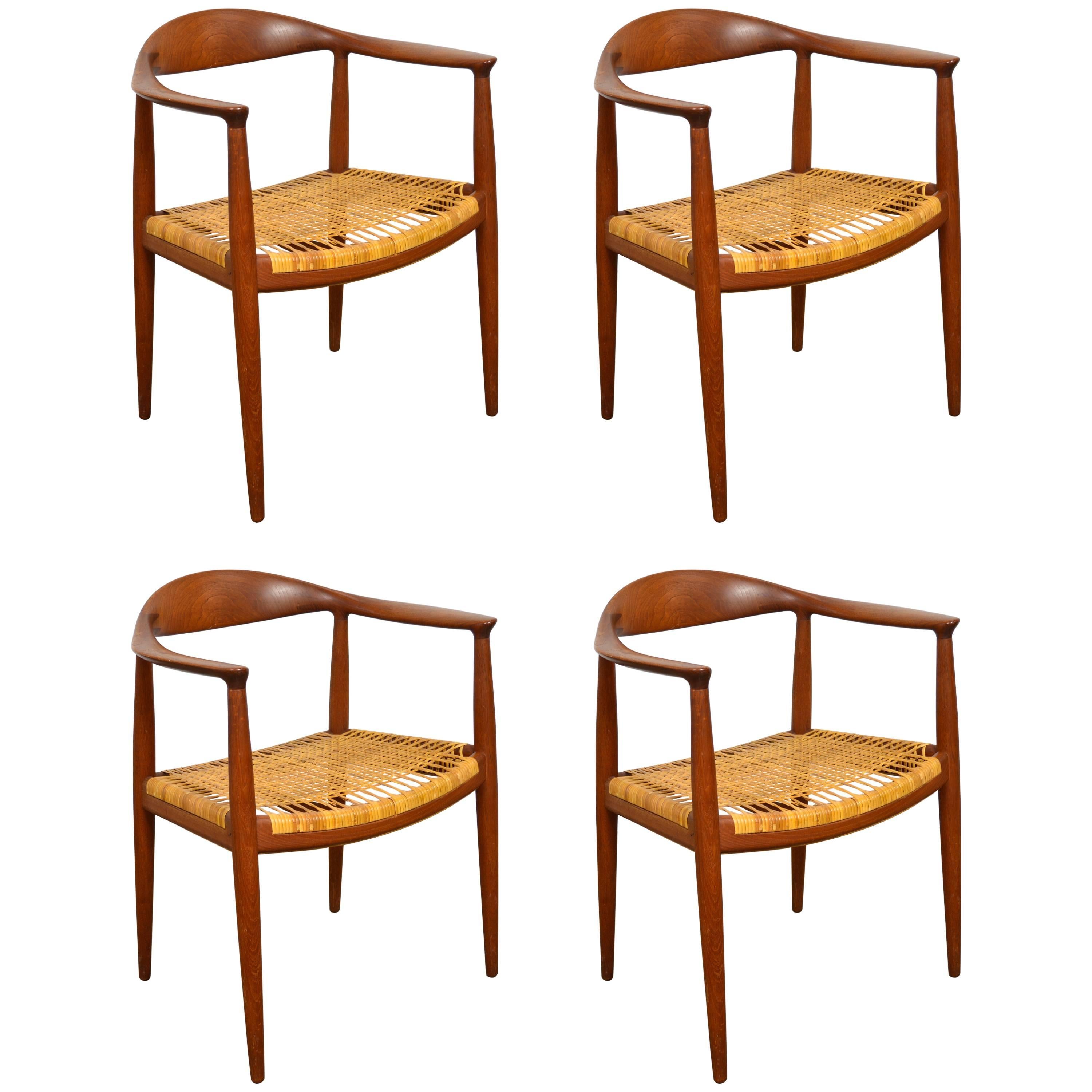 Set of Four Hans Wegner Round Chairs in Teak and Cane For Sale