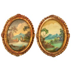 Pair of Signed Italian Oval Oil Paintings in Giltwood Frames