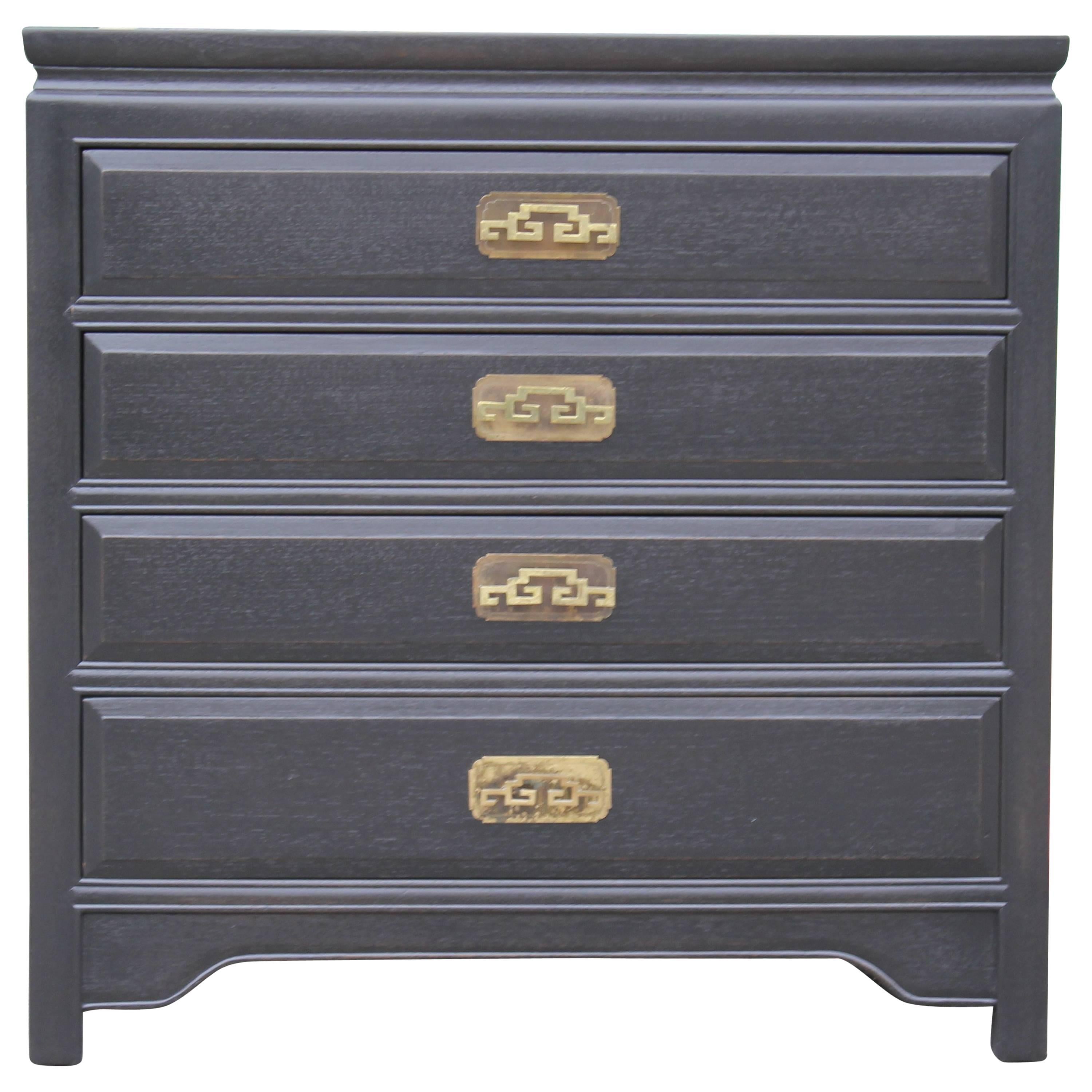 Pair of black mismatched Chests with brass Hardware by Chow's Oriental Furniture Co. in Houston, TX. These have been expertly lacquered in a nice black that contrasts the brass hardware beautifully. The chest with cabinet doors opens to reveal a