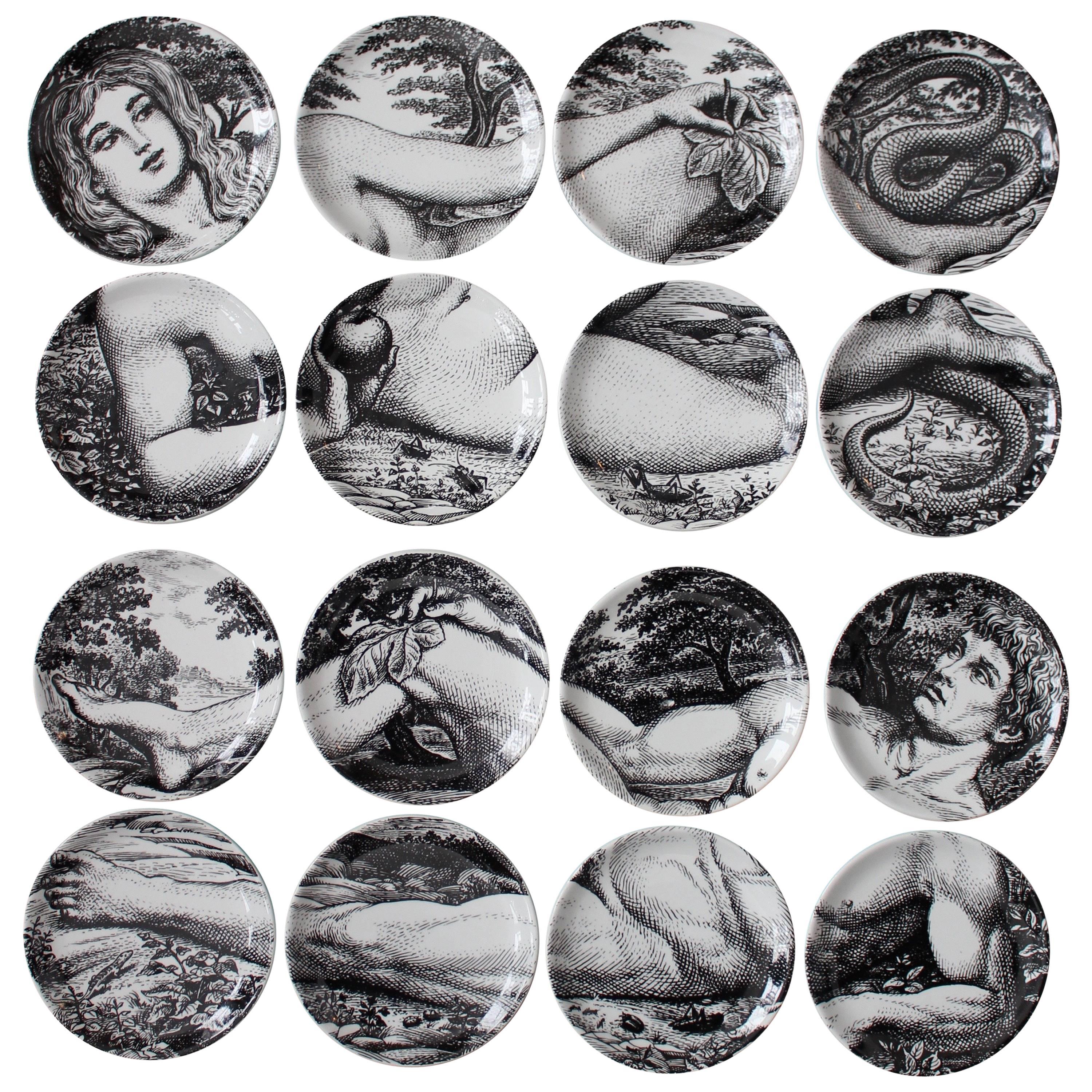 Two Complete Sets of Fornasetti Adam and Eve Coasters