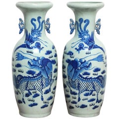 Pair of Chinese Blue and White Ceramic Dragon Vases 