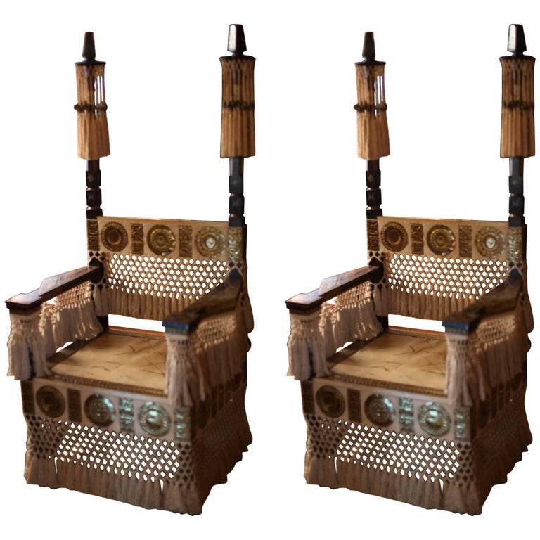 Pair of Carlo Bugatti throne armchairs, 1930s, offered by Ambianic
