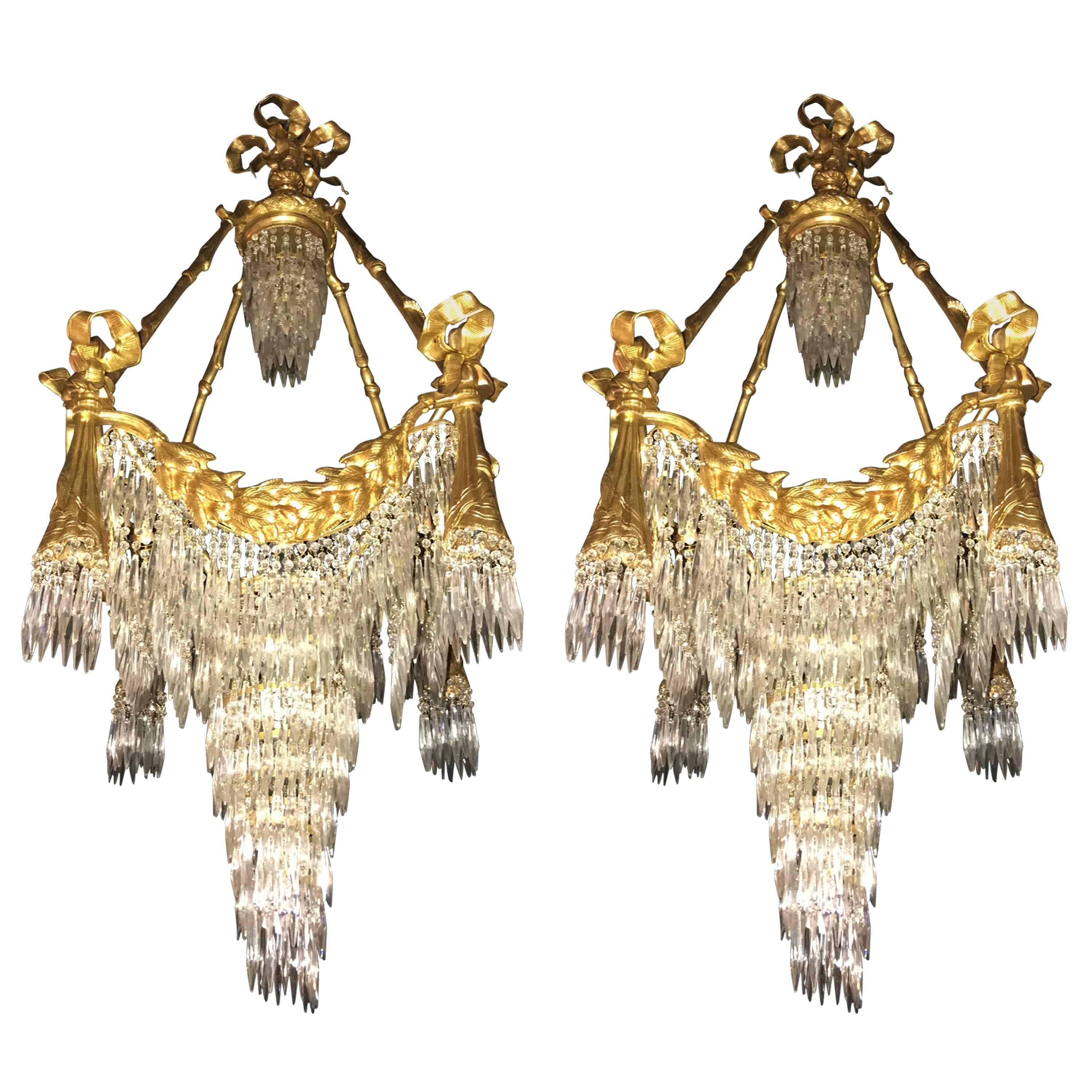 Pair of Bronze Louis XVI Style Crystal Ribbon and Tassle Drapery Chandeliers