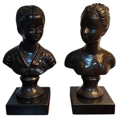 20th Century Bronze Busts of a Boy and a Girl on Black Marble Base