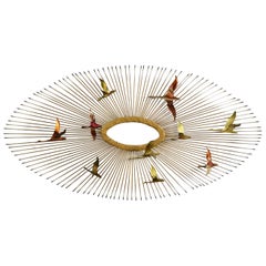 Mid-Century Modern Oval Sunburst and Bird Wall Sculpture Attributed to C. Jere