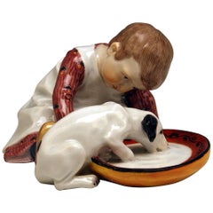 Meissener Hentschel Kinderknabenfigur mit trinkendem Hund Modell W 123:: um 1905