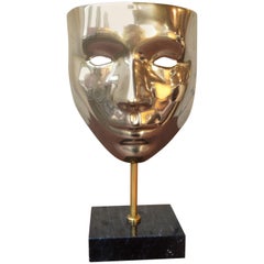 Vintage Brass Carnival Mask Mounted on Black Marble