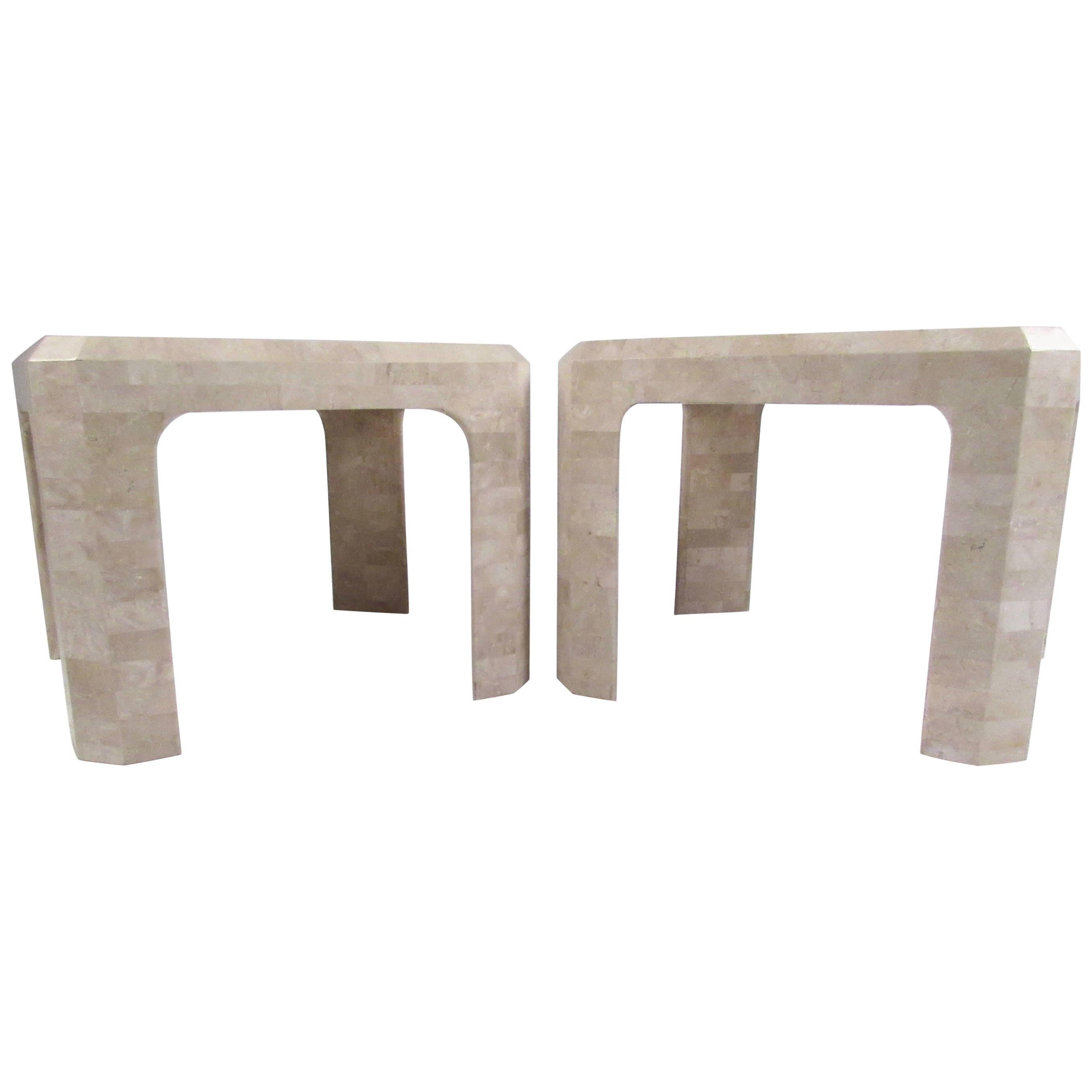 This stylish pair of modern end tables feature tessellated stone construction with brass trim inlay. Shapely design in the midcentury style of Maitland-Smith make this vintage pair the perfect addition to any living room seating arrangements,