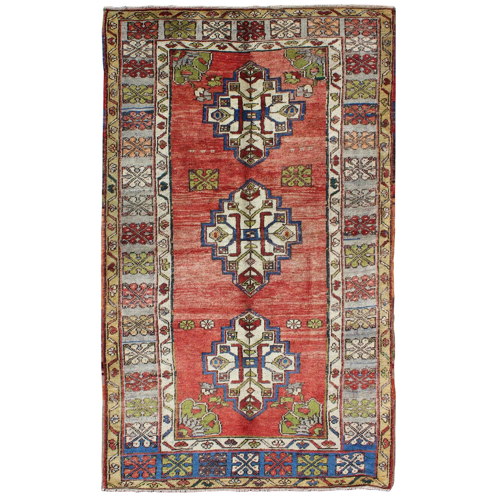 Green, Blue and Red Vintage Turkish Oushak Rug with Three Geometric Medallions For Sale
