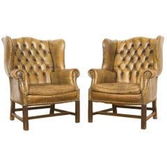 Pair of Two Cognac Leather Wingback Chesterfield Club Chairs, circa 1950