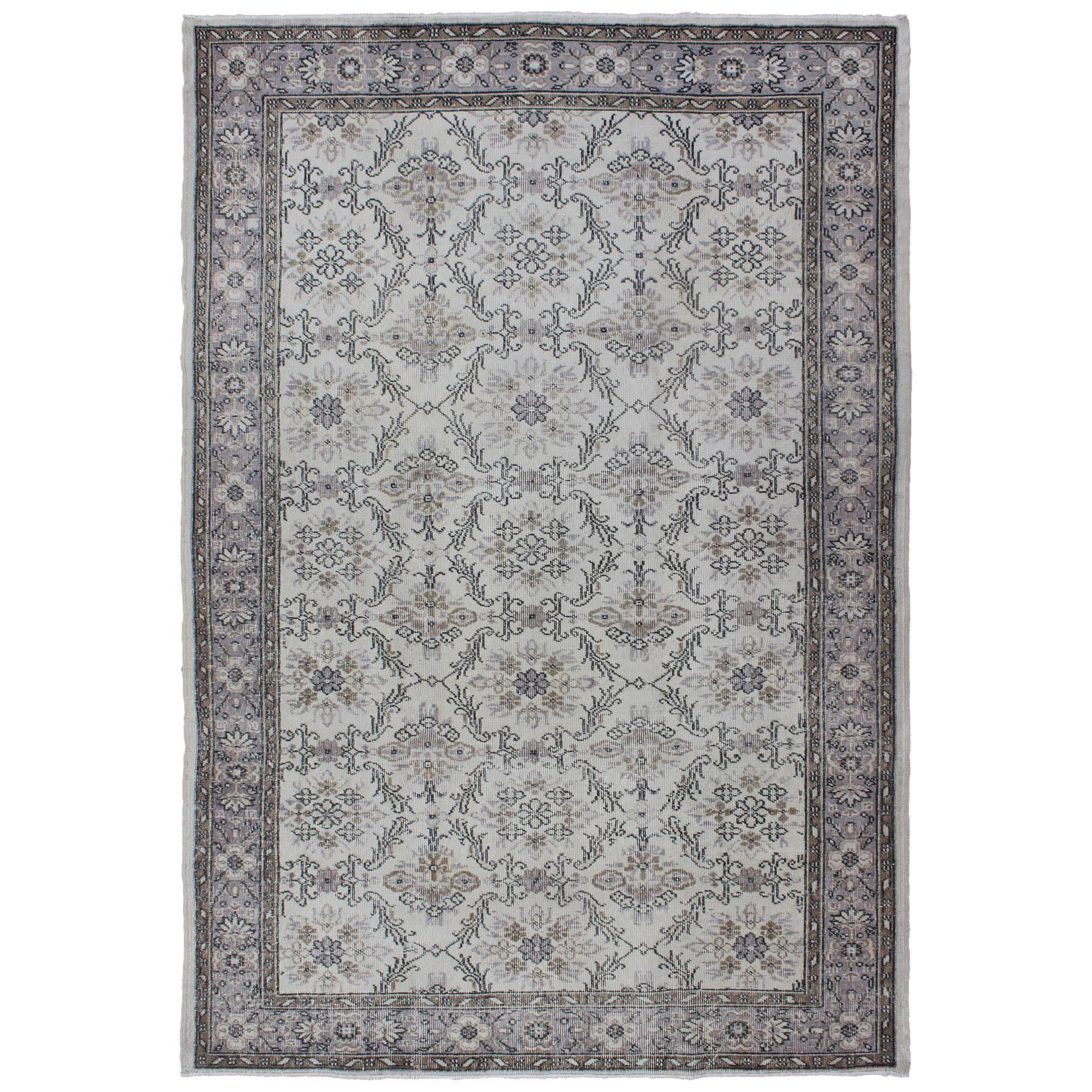 Midcentury Gray-Colored Turkish Oushak Rug with Stylized Floral Design