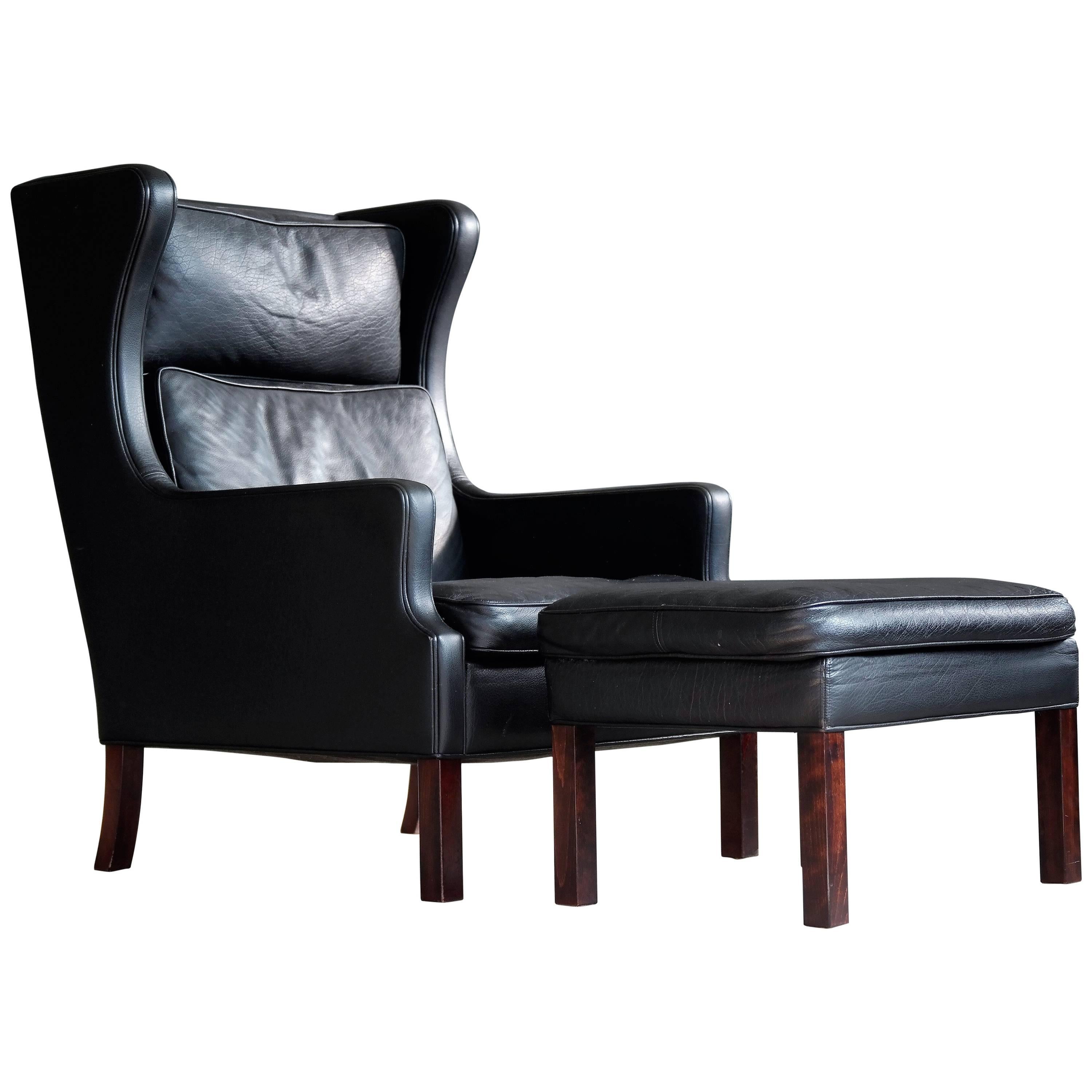 Borge Mogensen Style High Back Lounge Chair and Ottoman in Black Leather