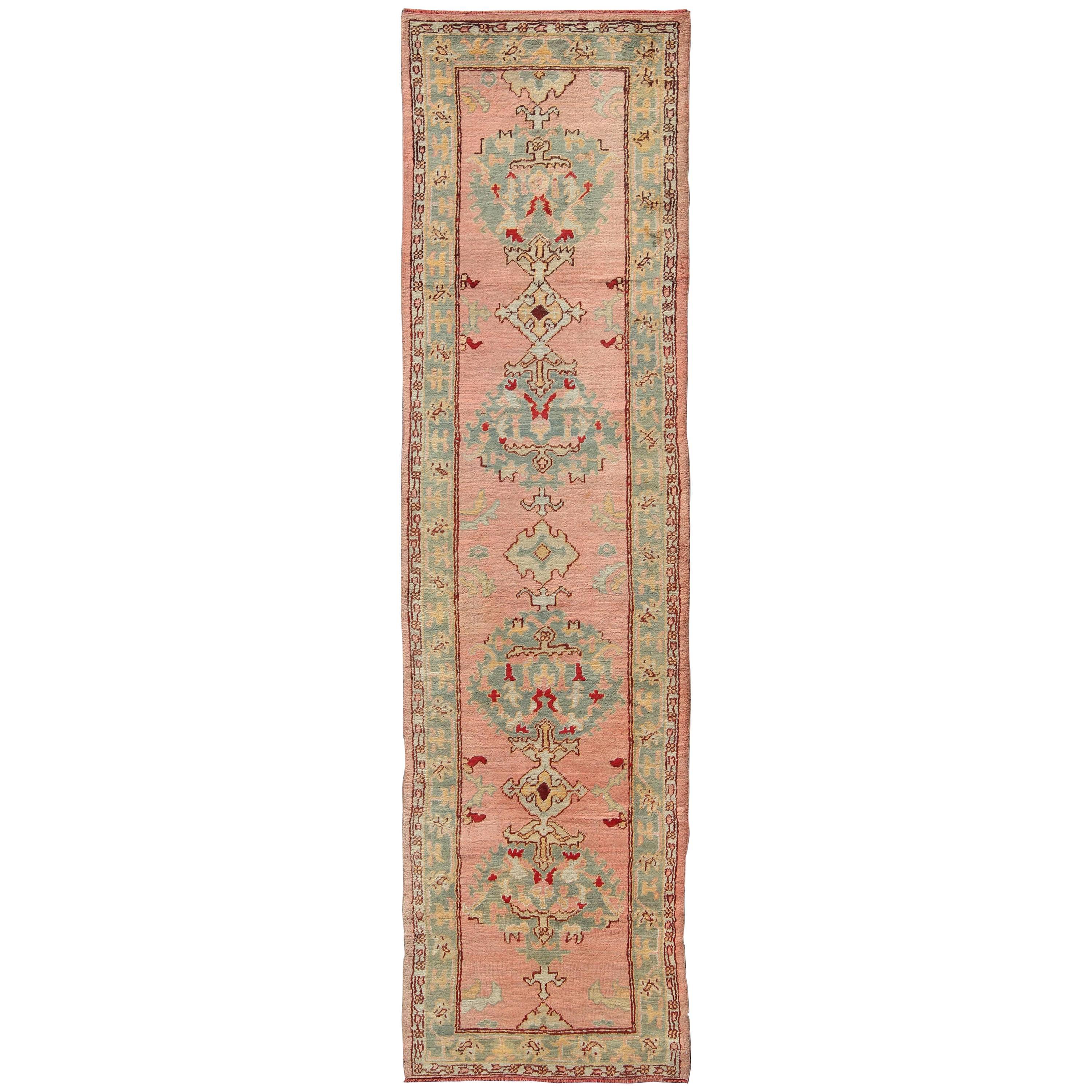 Salmon Pink Antique Turkish Oushak Runner with Stylized Floral Medallion Design