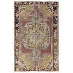Green, Brown and Yellow Vintage Turkish Oushak Rug with Center Medallion