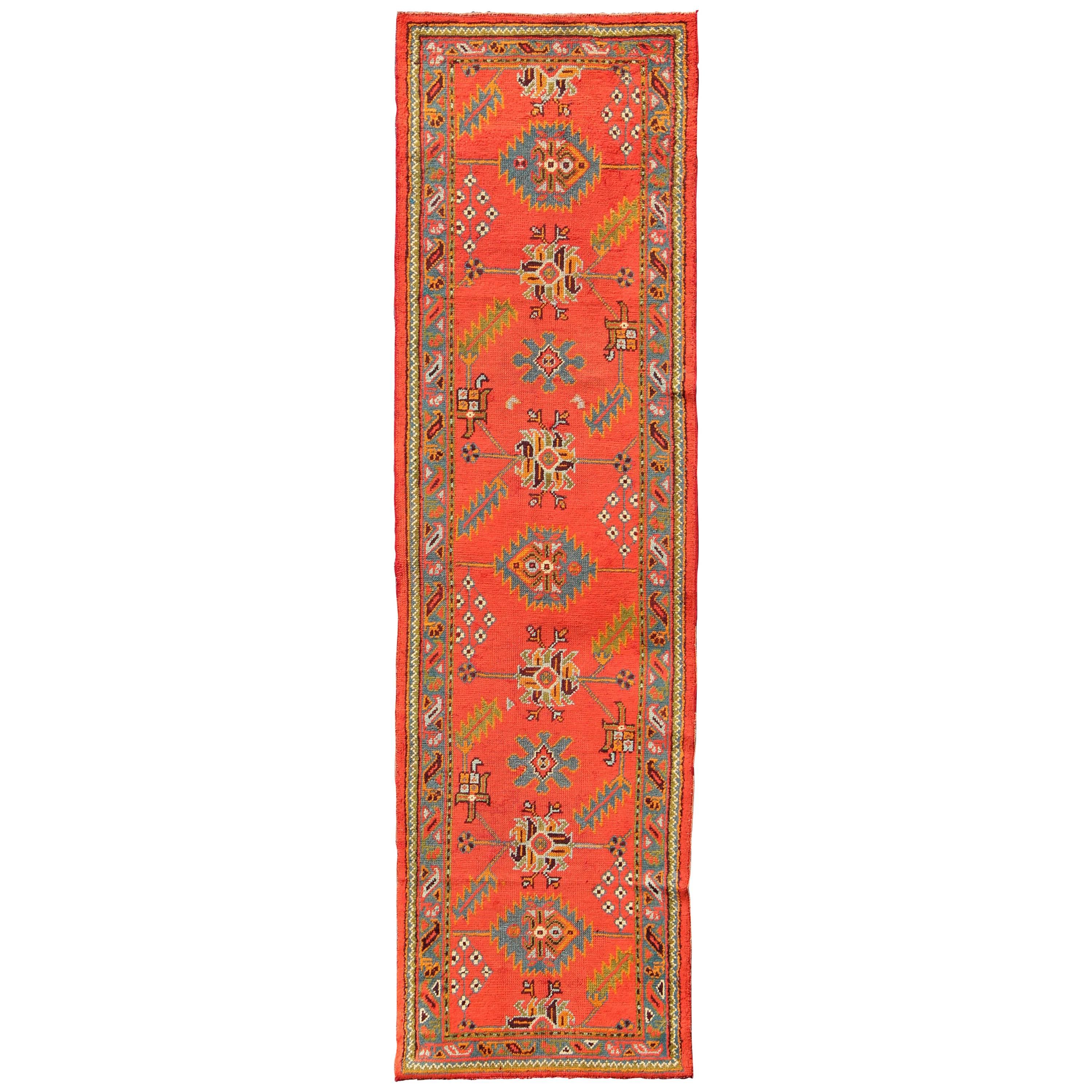 Bright Red Antique Turkish Oushak Runner with Sub-Geometric Tribal Motifs For Sale