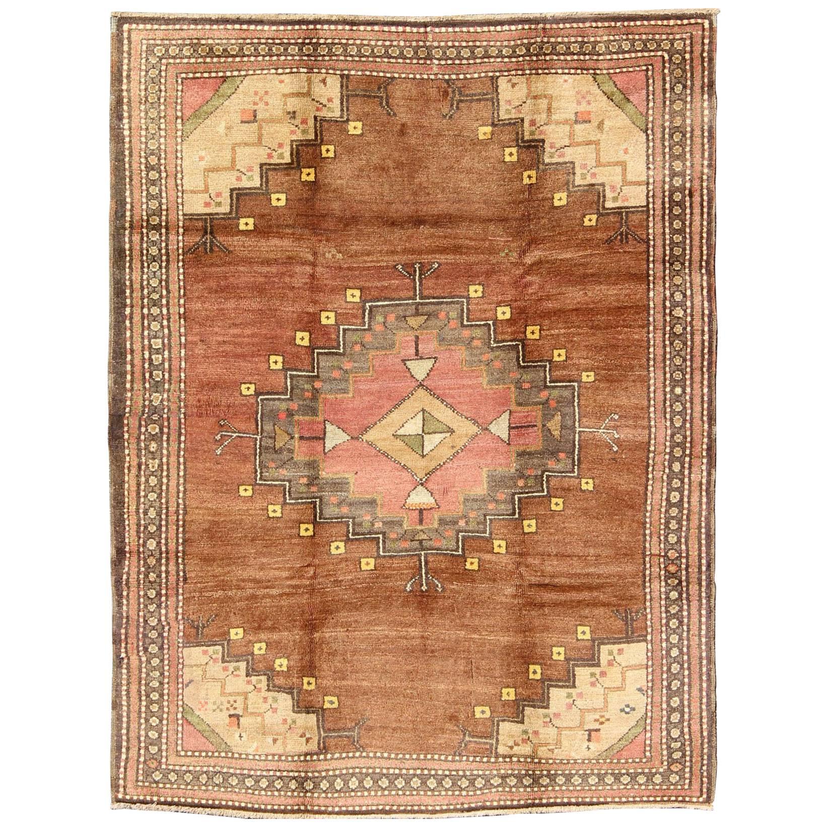 Tribal Medallion Vintage Turkish Oushak Rug in Shades of Brown and Red