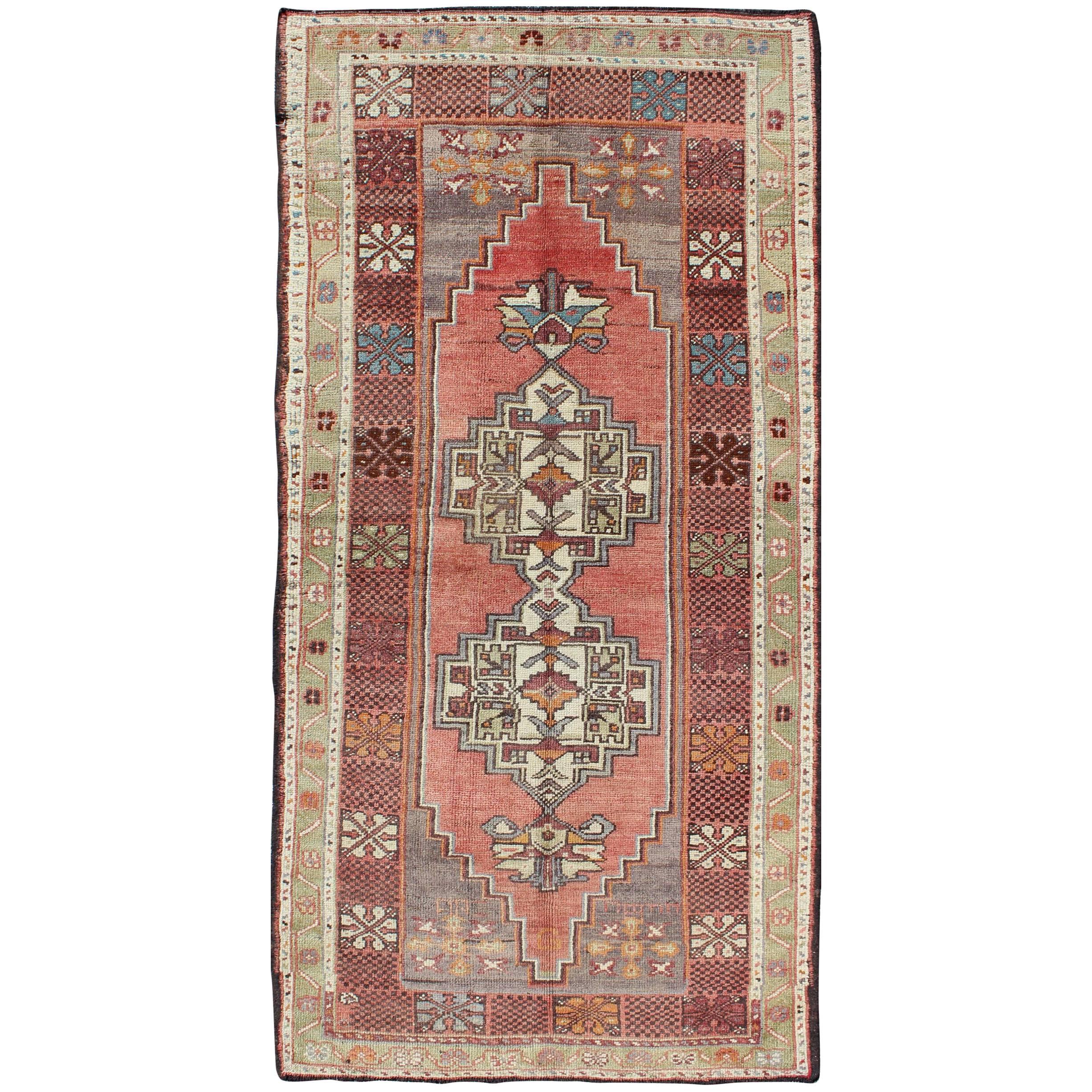 Soft Red and Green Vintage Turkish Oushak Rug with Sub-Geometric Dual Medallions