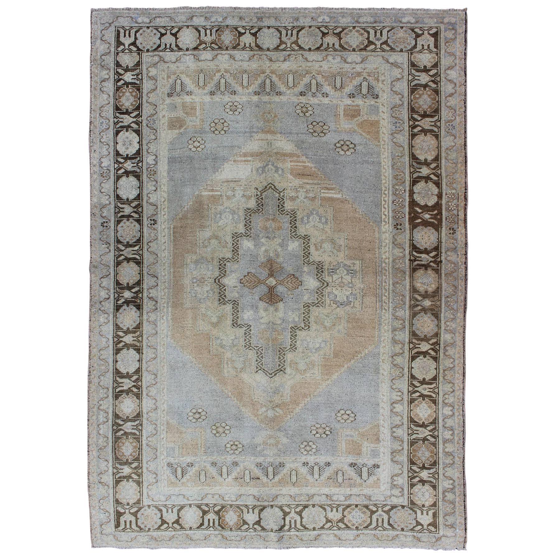 Periwinkle Blue and Tan Vintage Turkish Oushak Rug with Layered Medallion For Sale
