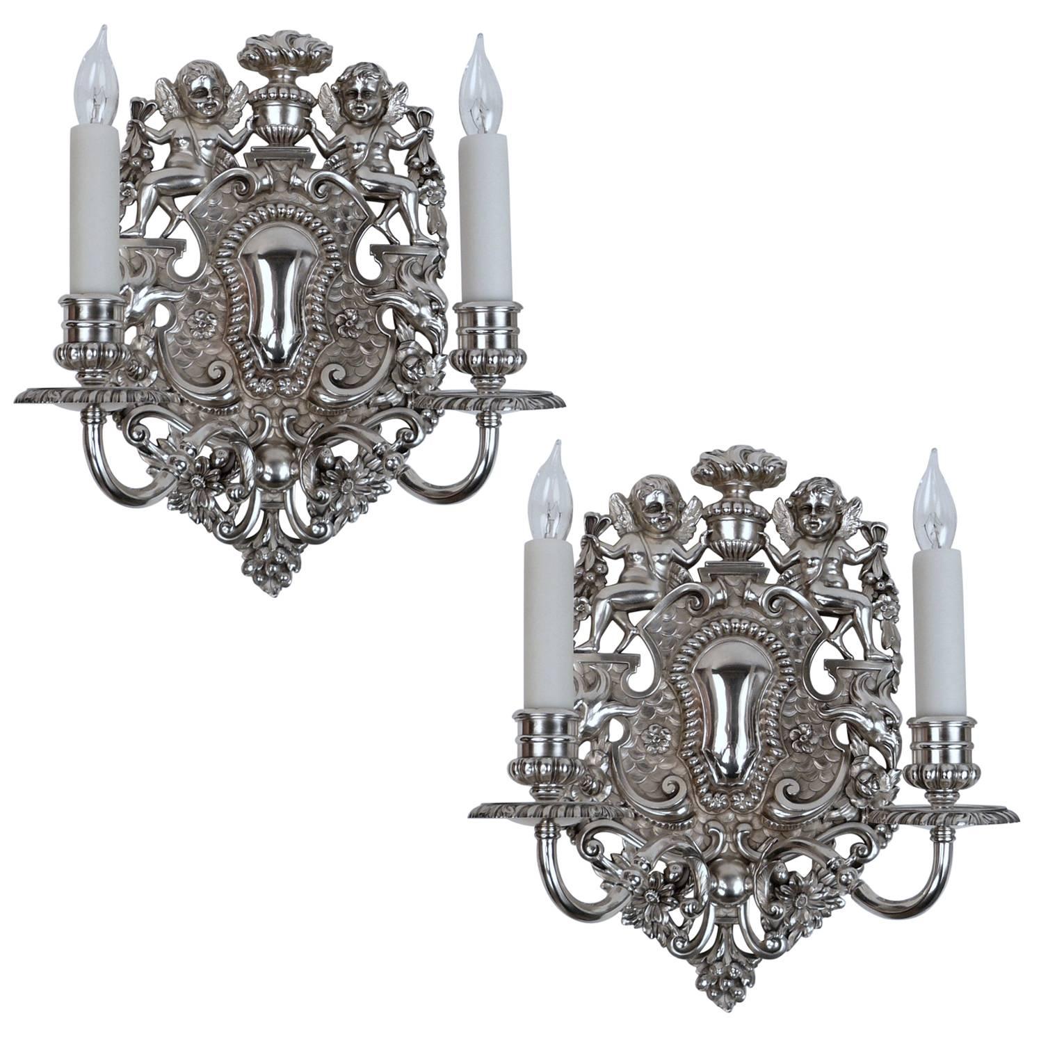 Pair of E. F. Caldwell Silvered Bronze Old English Style Twin Arm Sconces For Sale